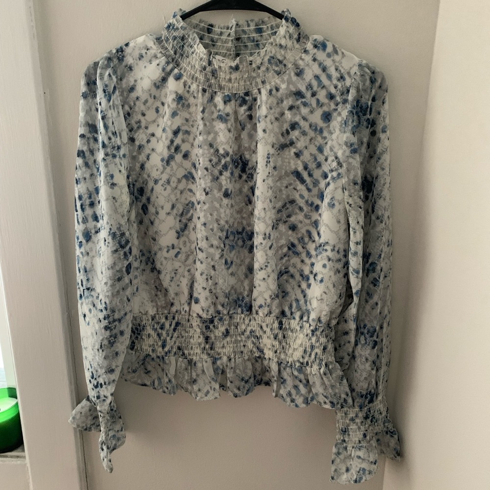 NWOT. High-neck women’s blouse. Size medium. Cropped to just above waist